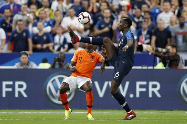 (L-R) Quincy Promes of Holland, Paul Pogba of France during the UEFA Nations League A group 1 qualifying match between France and The Netherlands on September 09, 2018 at Stade de France in Saint Denis, France UEFA Nations League A group 1 2018 2019 xVIxVIxImagesx xMauricexvanxSteenxIVx 12067495