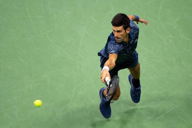 Novak Djokovic of Serbia hits a return to Juan Martin del Potro of Argentina in the Men s Final in Arthur Ashe Stadium at the 2018 US Open Tennis Championships at the USTA Billie Jean King National Tennis Center in New York City on September 9, 2018.  NYP20180909524 COREYxSIPKIN