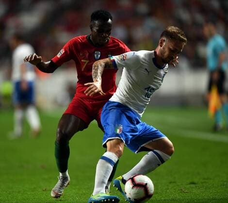 (180911) -- LISBON, Sept.11, 2018 -- Bruma (L) of Portugal vies with Manuel Lazzari of Italy during the UEFA Nations League soccer match between Portugal and Italy at Luz Stadium in Lisbon, Portugal, on Sept. 10, 2018. Portugal won 1-0. )(wll) (SP)PORTUGAL-LISBON-SOCCER-UEFA-NATIONS LEAGUE-PORTUGAL VS ITALY ZhangxLiyun 