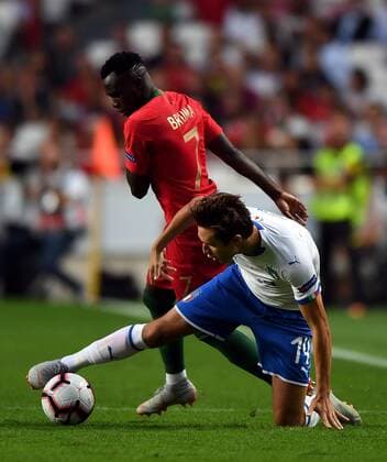 (180911) -- LISBON, Sept.11, 2018 -- Bruma (L) of Portugal vies with Federico Chiesa of Italy during the UEFA Nations League soccer match between Portugal and Italy at Luz Stadium in Lisbon, Portugal, on Sept. 10, 2018. Portugal won 1-0. )(wll) (SP)PORTUGAL-LISBON-SOCCER-UEFA-NATIONS LEAGUE-PORTUGAL VS ITALY ZhangxLiyun 