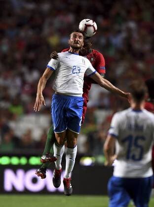 (180911) -- LISBON, Sept.11, 2018 -- Bryan Cristante (L) of Italy heads the ball with William Carvalho of Portugal during the UEFA Nations League soccer match between Portugal and Italy at Luz Stadium in Lisbon, Portugal, on Sept. 10, 2018. Portugal won 1-0. )(wll) (SP)PORTUGAL-LISBON-SOCCER-UEFA-NATIONS LEAGUE-PORTUGAL VS ITALY ZhangxLiyun 