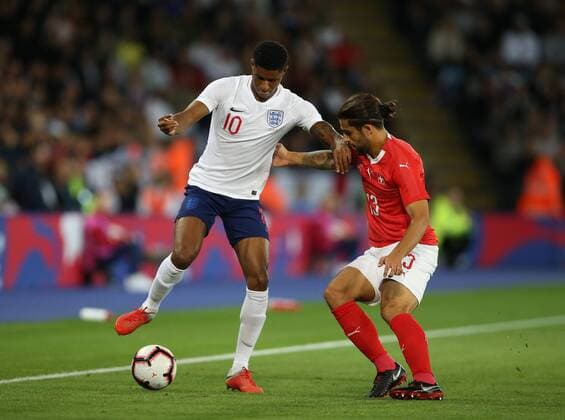 Marcus Rashford of England tackled by Ricardo Rodriguez of Switzerland during the International Friendly Länderspiel match at the King Power Stadium, Leicester. Picture date 11th September 2018. Picture credit should read: Nigel French Sportimage EDITORIAL USE ONLY. No use with unauthorised audio, video, data, fixture lists, club league logos or live services. Online in-match use limited to 120 images, no video emulation. No use in betting, games or single club league player publications.
