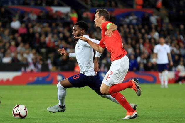 11th September 2018, King Power Stadium, Leicester, England; International Football Friendly, England versus Switzerland; Francois Moubandje of Switzerland competes for the ball with Danny Rose of England  ActionPlus12061772 ShaunxBrooks
