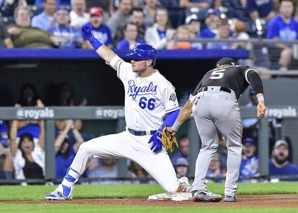 September 11, 2018 - Kansas City, MO, USA - The Kansas City Royals Ryan O Hearn (66) reaches third before the tag from Chicago White Sox third baseman Yolmer Sanchez on a triple in the fourth inning on Tuesday, Sept. 11, 2018, at Kauffman Stadium in Kansas City, Mo. Chicago White Sox at Kansas City - ZUMAm67_ 20180911_zaf_m67_025 Copyright: xJohnxSleezerx