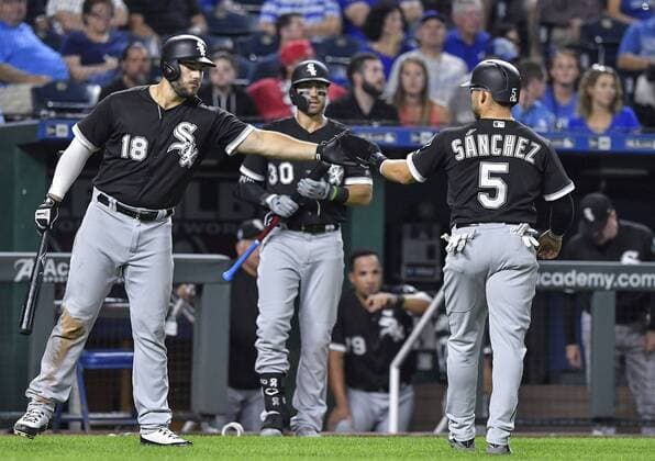 September 11, 2018 - Kansas City, MO, USA - The Chicago White Sox s Yolmer Sanchez (5) is greeted by Daniel Palka after Sanchez scored on a single by Avisail Garcia in the third inning against the Kansas City Royals on Tuesday, Sept. 11, 2018, at Kauffman Stadium in Kansas City, Mo. Chicago White Sox at Kansas City - ZUMAm67_ 20180911_zaf_m67_022 Copyright: xJohnxSleezerx