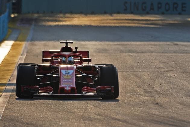 (180914) -- SINGAPORE, Sept. 14, 2018 -- Ferrari s driver Sebastian Vettel of Germany drives in the first practise session of the Formula One Singapore Grand Prix Night Race held at the Marina Bay Street Circuit in Singapore, on Sept. 14, 2018. ) (SP)SINGAPORE-F1-SINGAPORE GRAND PRIX NIGHT RACE-PRACTISE ThenxChihxWey 