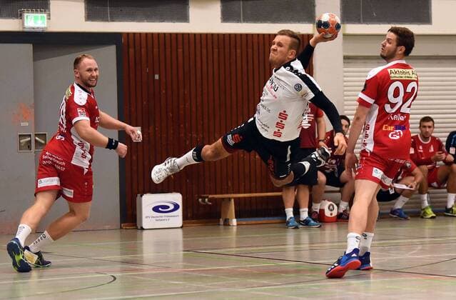 14.09.2018, xpsx, Handball 3.Liga, HSG Hanau - HSG Rodgau Nieder-Roden v.l. Jannik Ruppert (Hanau), Philipp Keller (Rodgau) Hanau Hessen Deutschland (DEU)