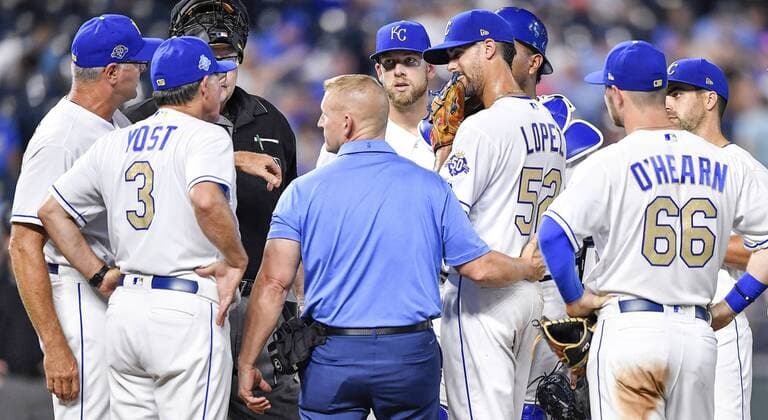 September 14, 2018 - Kansas City, MO, USA - Kansas City Royals starting pitcher Jorge Lopez is checked on before leaving the game in the fifth inning with an injury against the Minnesota Twins on Friday, Sept. 14, 2018, at Kauffman Stadium in Kansas City, Mo. Minnesota at Kansas City - ZUMAm67_ 20180914_zaf_m67_030 Copyright: xJohnxSleezerx