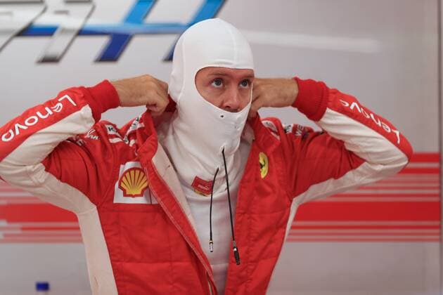 15th September 2018, Marina Bay Street Circuit, Singapore; Formula One Grand Prix of Singapore, Qualification; Scuderia Ferrari, Sebastian Vettel  ActionPlus12062515 Octane
