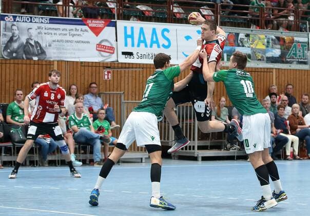 v.li.: Toni Podpolinski (VfL Lübeck-Schwartau), Philipp Meyer (DJK Rimpar Wölfe), Pawel Genda (VfL Lübeck-Schwartau), Lukas Böhm (DJK Rimpar Wölfe), DKB 2. Handball-Bundesliga, DJK Rimpar Wölfe - VfL Lübeck-Schwartau,