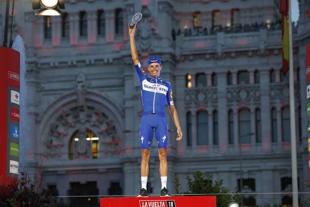 Spanish Enric Mas of Quick-Step Floors celebrates on the podium after winning the best young rider trophy at the 21st and final stage of the Vuelta a Espana , Tour of Spain cycling race, 100,9km from Alcorcon to Madrid, Spain, Sunday 16 September 2018. FRANCE OUT YUZURUxSUNADA  x05427741x