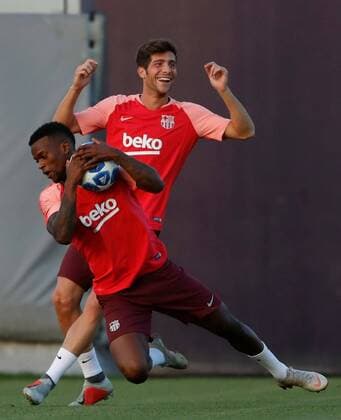 FC Barcelona Barca s Portuguese defender Nelson Semedo (L) and midfielder Sergi Roberto participate in a training session of the team before the first round of the UEFA Champions League, in which PSV Eindhoven and FC Barcelona will play at the Camp Nou stadium, in Barcelona, Catalonia, Spain, 17 September 2018. FC Barcelona s training session !ACHTUNG: NUR REDAKTIONELLE NUTZUNG!  Copyright: xEnricxFontcubertax SJD06 20180917-636728128386812986