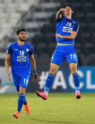 (180918) -- DOHA, Sept. 18, 2018 -- Morteza Tabrizi (R) of Esteghlal FC celebrates after scoring the second goal during the AFC Asian Champions League quarterfinal second leg football match between Qatar s Al Sadd and Iran s Esteghlal FC in Doha, capital of Qatar, Sept. 17, 2018. Al Sadd was qualified for the semifinal after a 2-2 draw in the second leg of the quarterfinal with Esteghlal FC gave them a 5-3 aggregate win. ) (SP)QATAR-DOHA-FOOTBALL-AFC-ASIAN CHAMPIONS LEAGUE Nikku 