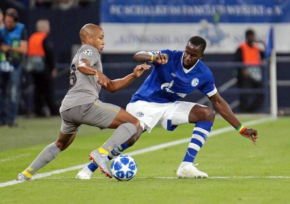 18.09.2018, xovx, Fussball UEFA Champions League, FC Schalke 04 - FC Porto emspor, v.l. Yacine Brahimi (FC Porto), Salif Sane (FC Schalke 04), Aktion . (DFL DFB REGULATIONS PROHIBIT ANY USE OF PHOTOGRAPHS as IMAGE SEQUENCES and or QUASI-VIDEO) Gelsenkirchen