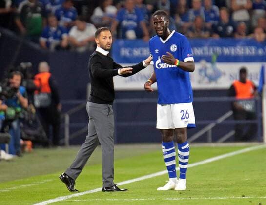 18.09.2018, xovx, Fussball UEFA Champions League, FC Schalke 04 - FC Porto emspor, v.l. Trainer Domenico Tedesco (FC Schalke 04), Salif Sane (FC Schalke 04), Freisteller. (DFL DFB REGULATIONS PROHIBIT ANY USE OF PHOTOGRAPHS as IMAGE SEQUENCES and or QUASI-VIDEO) Gelsenkirchen