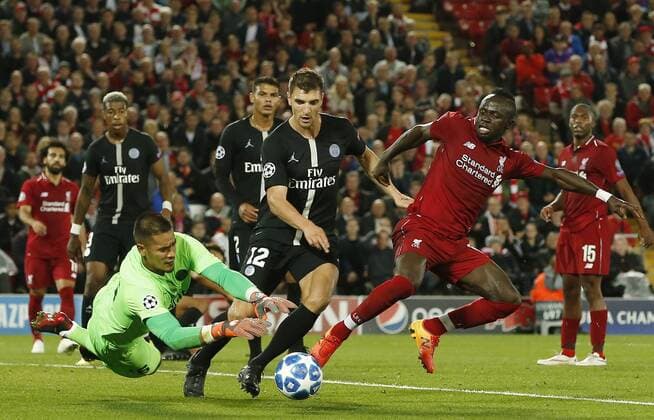 Liverpool midfielder Sadio Mane pressures PSG goalkeeper Alphonse Areola during the UEFA Champions League - Group C match at the Anfield Stadium, Liverpool. Picture date 18th September 2018. Picture credit should read: Andrew Yates Sportimage EDITORIAL USE ONLY. No use with unauthorised audio, video, data, fixture lists, club league logos or live services. Online in-match use limited to 120 images, no video emulation. No use in betting, games or single club league player publications.