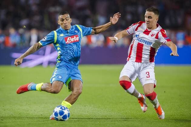18th September 2018, Rajko Mitic Stadium, Belgrade, Serbia; UEFA Champions League football, Red Star Belgrade versus Napoli; Allan of Napoli crosses while Branko Jovicic of Red Star Belgrade tries to block him  ActionPlus12063616 NikolaxKrstic