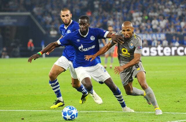 Gelsenkirchen, Germany 18.09.2018, UEFA Champions League - 2018 19 Season, Gruppenphase - Gruppe D - 1. Spieltag, FC Schalke 04 - FC Porto, Salif Sane (S04) und Yacine Brahimi (Porto) im zweikampf ( DeFodi521