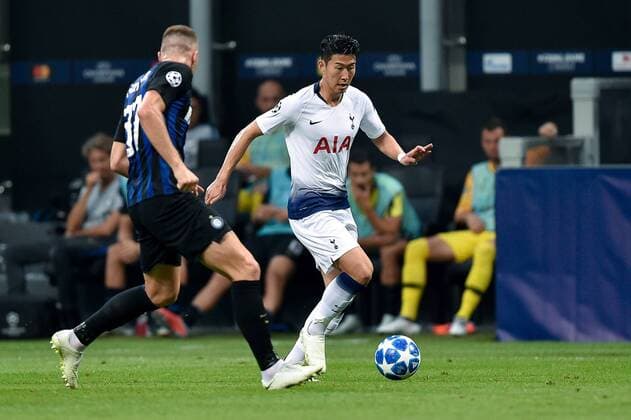September 18, 2018 - Son Heung-Min of Tottenham Hotspur and Milan Skriniar of Inter Milan fight for the ball during the UEFA Champions League Group B match between Inter Milan and Tottenham Hotspur at Stadio San Siro, Milan, Italy on 18 September 2018. Giuseppe Maffia. Soccer: Champions League - Inter Milan v Tottenham - ZUMAa181 20180918_zaa_a181_022 Copyright: xAFP7x