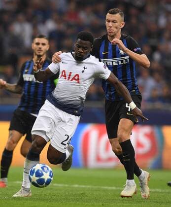 (180919) -- MILAN, Sept. 19, 2018 -- Inter Milan s Ivan Perisic (1st R) vies with Tottenham s Serge Aurier (C) during a UEFA Champions League group B match between FC Inter and Tottenham Hotspur, in Milan, Italy, Sept. 18, 2018. FC Inter won 2-1. ) (SP)ITALY-MILAN-UEFA CHAMPIONS LEAGUE-INTER-HOTSPUR AlbertoxLingria 