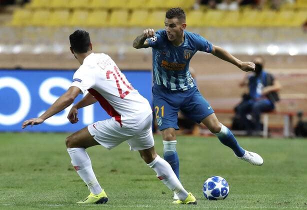 (180919) -- FONTVIEILLE, Sept. 19, 2018 -- Nacer Chadli (L) of As Monaco vies with Lucas Hernandez of Atletico Madrid during the UEFA Champions League group A match between As Monaco and Atletico Madrid in Fontvieille, Monaco on Sept. 18, 2018. Atletico Madrid won 2-1. ) (SP)MONACO-FONTVIEILLE-FOOTBALL-UEFA CHAMPIONS LEAGUE-AS MONACO VS ATLETICO MADRID MiguelxAlmaro 