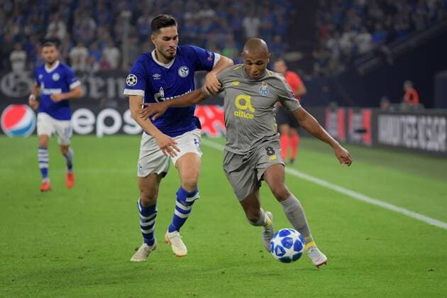 UEFA Champions League, Gruppenphase, Spiel 1, Saison 2018 2019, FC Schalke 04 vs FC Porto, 18.09.18. Veltinsarena Gelsenkirchen , Suat Serdar, S04, Yacine Brahimi, FC Porto, UEFA regulations prohibit any use of photographs as image sequences and or quasi-video.