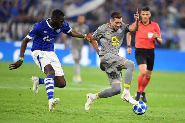 UEFA Champions League, Gruppenphase, Spiel 1, Saison 2018 2019, FC Schalke 04 vs FC Porto, 18.09.18. Veltinsarena Gelsenkirchen,Salif Sane ,S04, Hector Herrera, FC Porto UEFA regulations prohibit any use of photographs as image sequences and or quasi-video.