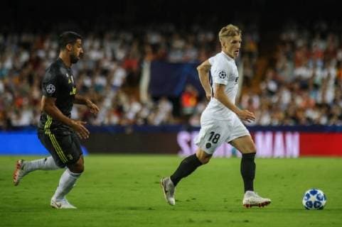Khedira and Wass during the football match between Valencia CF and Juventus FC on September 19, 2018 at Mestalla stadium in Valencia, Spain.