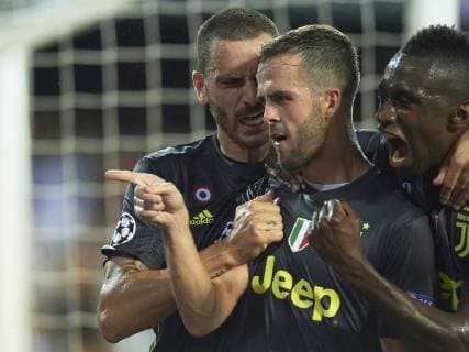 BARCELONA, 19-09-2018. Champions League 2018 2019, date 1. Valencia-Juventus. MIralem Pjanic of Juventus celebrates his goal with his teammates during the game Valencia - Juventus Valencia - Juventus  x2477527x