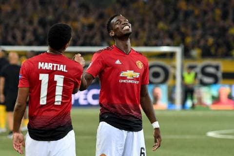 Fussball UEFA Champions League - BSC Young Boys - Manchester United ManU FC Bern, Schweiz, 19.09.2018, Fussball UEFA Champions League, Saison 2018 2019, BSC Young Boys - Manchester United FC, Manchesters Paul Pogba (rechts) feiert mit Anthony Martial den 0:3 Sieg in Bern.