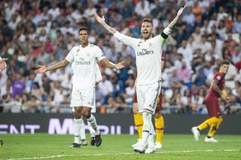 September 19, 2018 - Madrid, Spain - Real Madrid Raphael Varane and Sergio Ramos during UEFA Champions League match between Real Madrid and A.S.Roma at Santiago Bernabeu Stadium in Madrid, Spain. September 19, 2018. Real Madrid v AS Roma - UEFA Champions League Group G  - ZUMAn230 20180919_zaa_n230_267 Copyright: xCoolmediax
