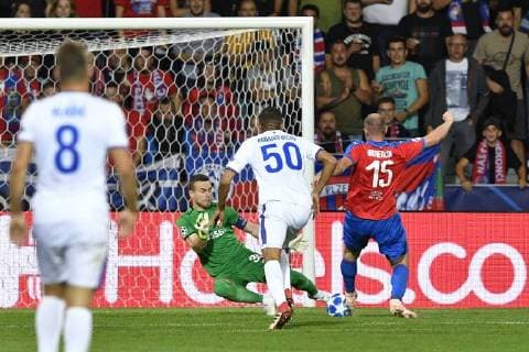 L-R Nikola Vlasic, goalkeeper Igor Akinfeev and Rodrigo Becao of CSKA, left, and scoring Michael Krmencik of Viktoria in action during the 1st round, Group G, Champions League match FC Viktoria Plzen vs CSKA Moscow in Pilsen, Czech Republic, on September 19, 2018. (CTKxPhoto MichalxKamaryt) CTKPhotoP201809191054401  kmt 1