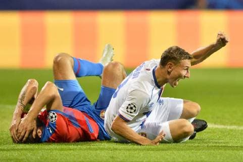 Roman Hubnik of Viktoria, left, and scoring Fyodor Chalov of CSKA in action during the 1st round, Group G, Champions League match FC Viktoria Plzen vs CSKA Moscow in Pilsen, Czech Republic, on September 19, 2018. (CTKxPhoto MiroslavxChaloupka) CTKPhotoP201809191080101  _CHA5210