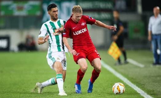 SOCCER - EL, Rapid vs Spartak VIENNA,AUSTRIA,20.SEP.18 - SOCCER - UEFA Europa League, group stage, SK Rapid Wien vs Spartak Moscow. Image shows Andrei Ivan (Rapid) and Nikolay Rasskazov (Spartak). GEPAxpictures xPhilippxBrem