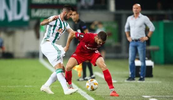 SOCCER - EL, Rapid vs Spartak VIENNA,AUSTRIA,20.SEP.18 - SOCCER - UEFA Europa League, group stage, SK Rapid Wien vs Spartak Moscow. Image shows Marvin Potzmann (Rapid) and Aleksandr Lomovitskiy (Spartak). GEPAxpictures xPhilippxBrem