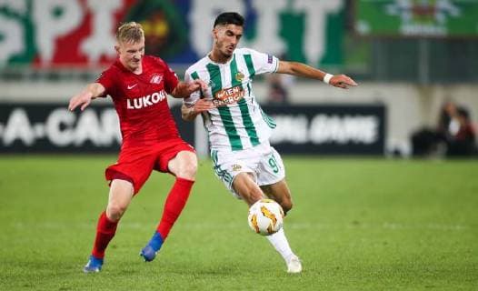 SOCCER - EL, Rapid vs Spartak VIENNA,AUSTRIA,20.SEP.18 - SOCCER - UEFA Europa League, group stage, SK Rapid Wien vs Spartak Moscow. Image shows Nikolay Rasskazov (Spartak) and Andrei Ivan (Rapid). Keywords: Wien Energie. GEPAxpictures xPhilippxBrem