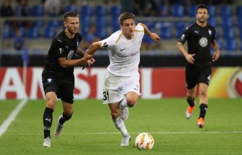 Fußball, EL, KRC Genk - Malmö FF Malmo FF s midfielder Arnor Ingvi Traustason and Genk s Joakim Maehle fight for the ball during the match between Belgian soccer team KRC Genk and Swedish club Malmo FF in Genk, Thursday 20 September 2018, on day one of the UEFA Europa League group stage. VIRGINIExLEFOUR  x05430193x
