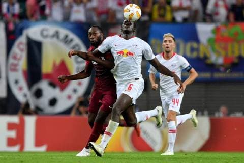 SOCCER - EL, RB Leipzig vs RBS LEIPZIG,GERMANY,20.SEP.18 - SOCCER - UEFA Europa League, group stage, RasenBallsport Leipzig vs Red Bull Salzburg. Image shows Reinhold Yabo (RBS) and Ibrahima Konate (RB Leipzig). GEPAxpictures xFlorianxErtl