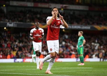 & xa7;20th September 2018, Emirates Stadium, London, England; UEFA Europa League football, Arsenal versus Vorskla Poltava; Mesut Ozil of Arsenal celebrates after scoring his sides 4th goal in the 74th minute to make it 4-0  ActionPlus12064077 JohnxPatrickxFletcher