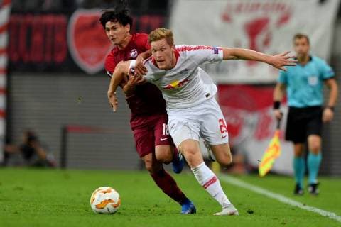 SOCCER - EL, RB Leipzig vs RBS LEIPZIG,GERMANY,20.SEP.18 - SOCCER - UEFA Europa League, group stage, RasenBallsport Leipzig vs Red Bull Salzburg. Image shows Takumi Minamino (RBS) and Marcel Halstenberg (RB Leipzig). GEPAxpictures xFlorianxErtl