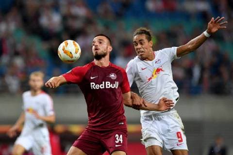 SOCCER - EL, RB Leipzig vs RBS LEIPZIG,GERMANY,20.SEP.18 - SOCCER - UEFA Europa League, group stage, RasenBallsport Leipzig vs Red Bull Salzburg. Image shows Marin Pongracic (RBS) and Yussuf Poulsen (RB Leipzig). GEPAxpictures xFlorianxErtl