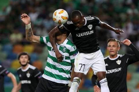 September 20, 2018 - Lisbon, Portugal - Qarabag s defender Donald Guerrier (C ) heads the ball with Sporting s defender Sebastian Coates from Uruguay during the UEFA Europa League Group E football match Sporting CP vs Qarabag at Alvalade stadium in Lisbon, on September 20, 2018. Sporting CP v Qarabag FK - UEFA Europa League - Group E  - ZUMAn230 20180920_zaa_n230_333 Copyright: xPedroxFiuzax