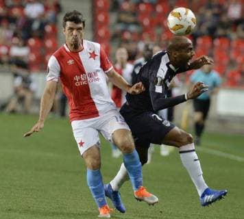 Ondrej Kudela of Slavia Praha, left, and Jimmy Briand of Bordeaux in action during the 1st round, Group C, UEFA Europa League match SK Slavia Praha vs Girondins Bordeaux in Prague, Czech Republic, on September 20, 2018 . (CTKxPhoto MichaelaxRihova) CTKPhotoP201809201074901  mir 1