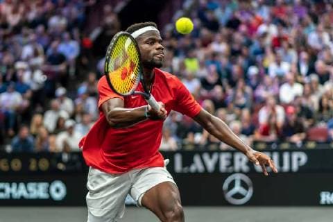 CHICAGO, IL - SEPTEMBER 21: Team World Frances Tiafoe of the United States returns a shot against Team Europe Grigor Dimitrov of of Bulgaria during their Men s Singles match on day one of the 2018 Laver Cup at the United Center on September 21, 2018 in Chicago, Illinois. (Photo by Robin Alam Icon Sportswire) TENNIS: SEP 21 Laver Cup Icon164180921101 EDITORIAL USE ONLY