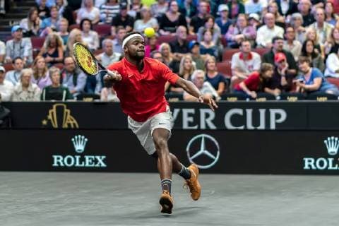 CHICAGO, IL - SEPTEMBER 21: Team World Frances Tiafoe of the United States returns a shot against Team Europe Grigor Dimitrov of of Bulgaria during their Men s Singles match on day one of the 2018 Laver Cup at the United Center on September 21, 2018 in Chicago, Illinois. (Photo by Robin Alam Icon Sportswire) TENNIS: SEP 21 Laver Cup Icon164180921103 EDITORIAL USE ONLY