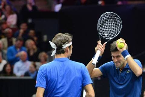 September 21, 2018 - Chicago, Illinois, United States - ROGER FEDERER and NOVAK DJOKOVIC in doubles action in the 2018 Laver Cup tennis event in Chicago. Tennis 2018: Laver Cup - ZUMAl132 20180921_zap_l132_017 Copyright: xChristopherxLevyx