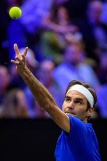 CHICAGO, IL - SEPTEMBER 22: Team Europe s Roger Federer of Switzerland serves to Team World s Nick Kyrgios of Australia during a singles match on day two of the 2018 Laver Cup on September 22, 2018, at the United Center in Chicago, Illinois. Federer beats Kyrgios 6-3 6-2. (Photo by Daniel Bartel Icon Sportswire) TENNIS: SEP 22 Laver Cup Icon180922021 EDITORIAL USE ONLY