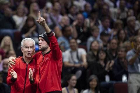 September 22, 2018 - Chicago, Illinois, U.S - Team World coach JOHN MCENROE and JACK SOCK of the United States celebrate JOHN ISNER S point during the first singles match between Team Europe and Team World on Day Two of the Laver Cup at the United Center in Chicago, Illinois. Laver Cup Day 1 - ZUMAl140 20180922_zap_l140_037 Copyright: xShelleyxLiptonx