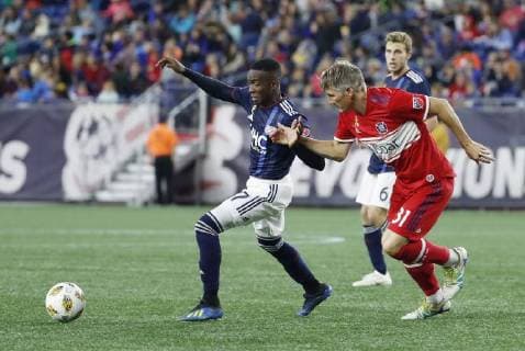 FOXBOROUGH, MA - SEPTEMBER 22: New England Revolution midfielder Luis Caicedo (27) fends off Chicago Fire midfielder Bastian Schweinsteiger (31) during a match between the New England Revolution and the Chicago Fire on September 22, 2018, at Gillette Stadium in Foxborough, Massachusetts. The teams played to a 2-2 draw. (Photo by Fred Kfoury III Icon Sportswire) SOCCER: SEP 22 MLS Fussball Herren USA - Chicago Fire at New England Revolution Icon482180922022 EDITORIAL USE ONLY