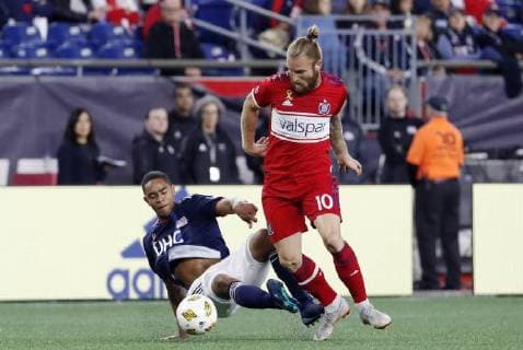 FOXBOROUGH, MA - SEPTEMBER 22: Chicago Fire midfielder Aleksandar Katai (10) steals the ball from New England Revolution defender Brandon Bye (15) during a match between the New England Revolution and the Chicago Fire on September 22, 2018, at Gillette Stadium in Foxborough, Massachusetts. The teams played to a 2-2 draw. (Photo by Fred Kfoury III Icon Sportswire) SOCCER: SEP 22 MLS Fussball Herren USA - Chicago Fire at New England Revolution Icon482180922008 EDITORIAL USE ONLY